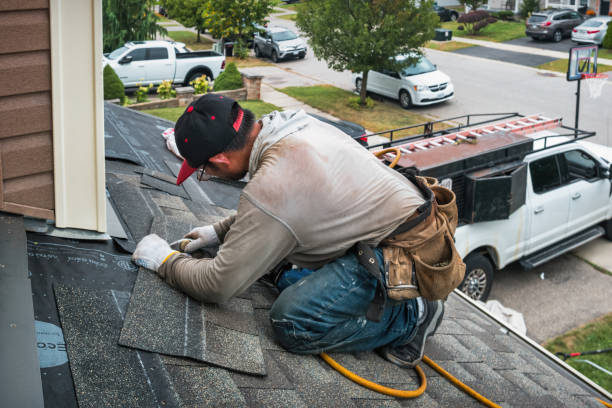 Professional Gutter Repair And Installation technician working in Cedar Crest, MA